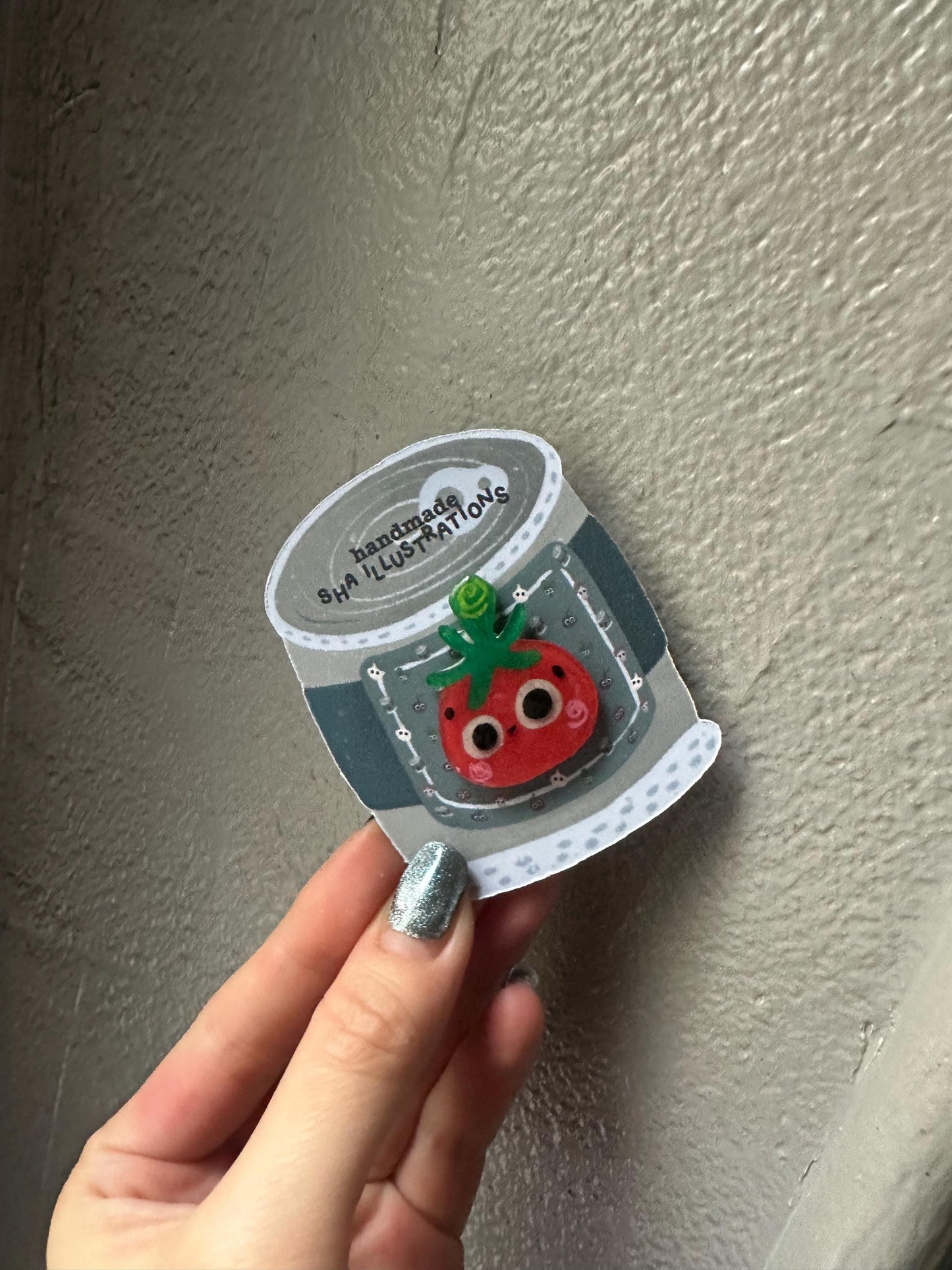 Pin's Tomate dans sa boîte de conserve